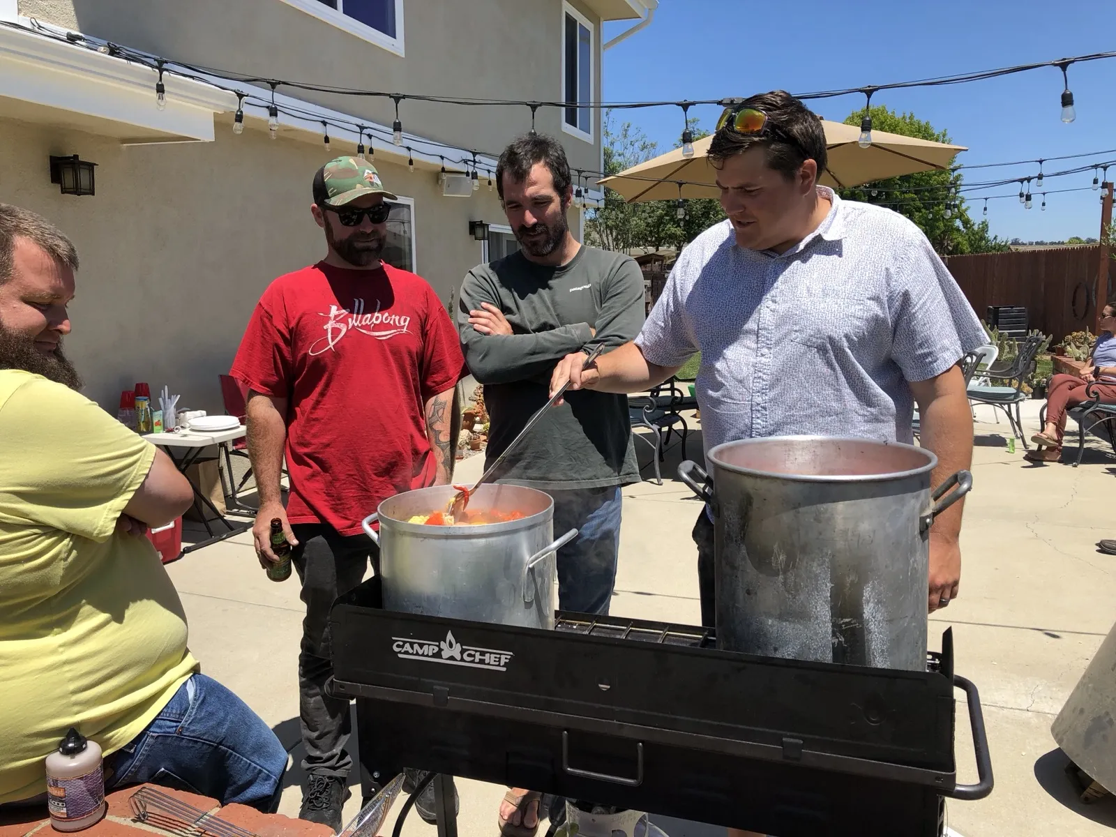 Cooking outdoors with friends during the journey